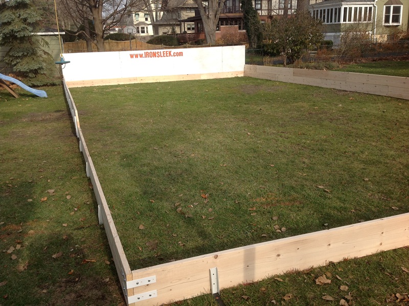 Plywood backyard ice rink boards.